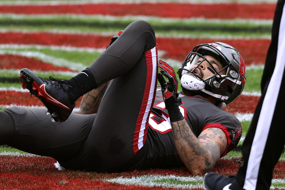 Tampa Bay Buccaneers wide receiver Mike Evans (13) reacts after injuring his leg against the Atlanta Falcons during the first half of an NFL football game Sunday, Jan. 3, 2021, in Tampa, Fla. Evans left the game. (AP Photo/Mark LoMoglio)