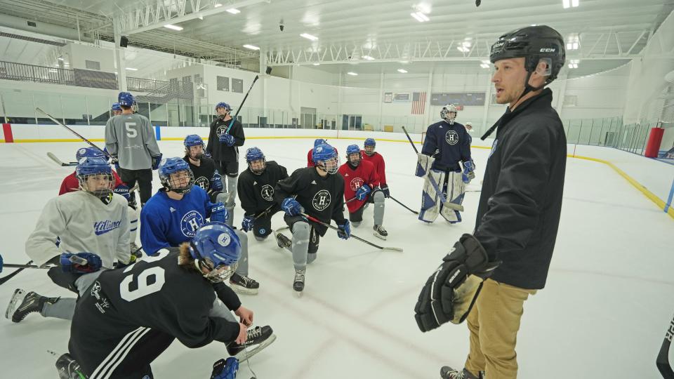 Hilliard coach Dave Cox instructs his players during practice at Chiller Dublin on Thursday.