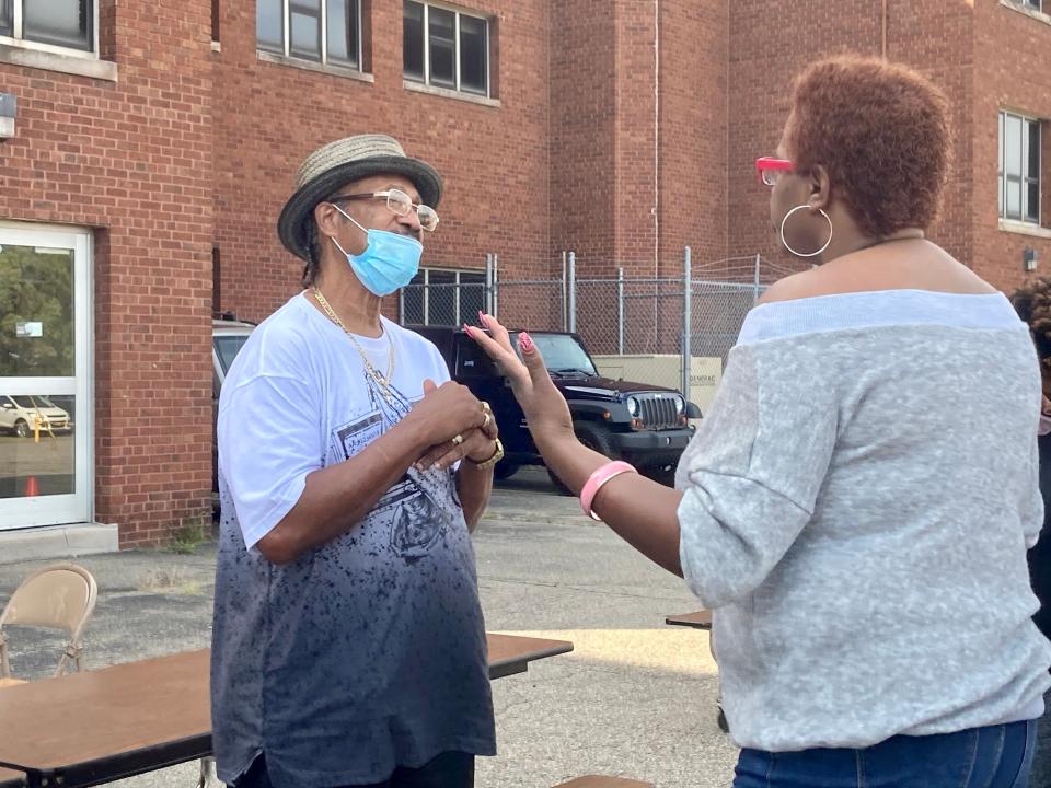 Mayoral candidate Jerry Steiner talks with Boonikka Herring, the only candidate running to represent Battle Creek's Ward 3, at a meet the candidates event on Sept. 26, 2020.