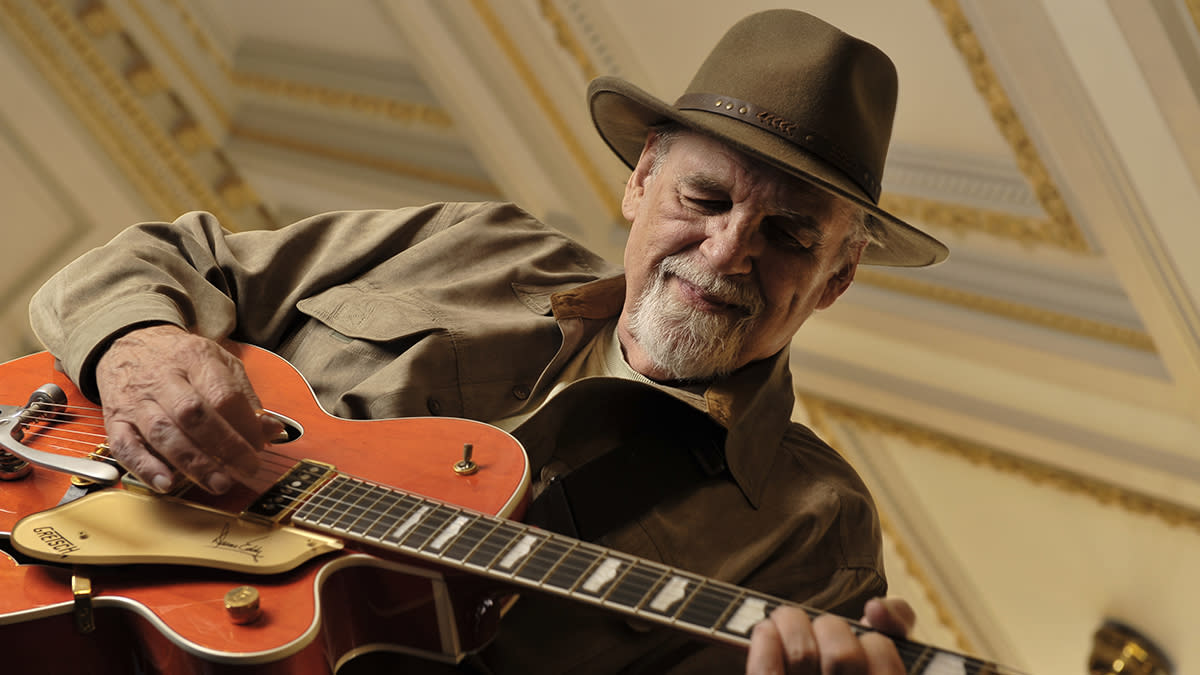  Duane Eddy playing a Gretsch electric guitar. 