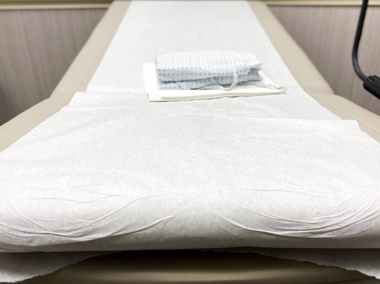 A reclining seat in an ob-gyn’s examination room.