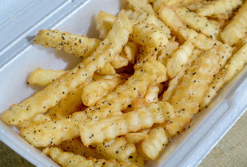 An order of Fort Clark Grill's seasoned french fries at the Northwoods Mall in Peoria.