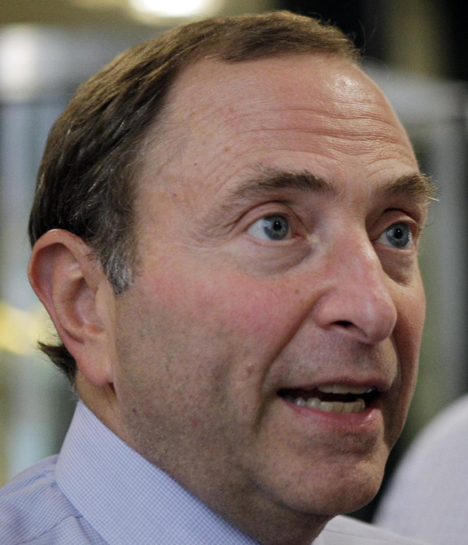 National Hockey League Commissioner Gary Bettman speaks to reporters about on going labor talks with the NHL Players Association outside the league's headquarters in New York, Tuesday, July 31, 2012. The current collective bargaining agreement ends on Sept. 15, and the NHL season is scheduled to open on Oct. 11. (AP Photo/Kathy Willens)