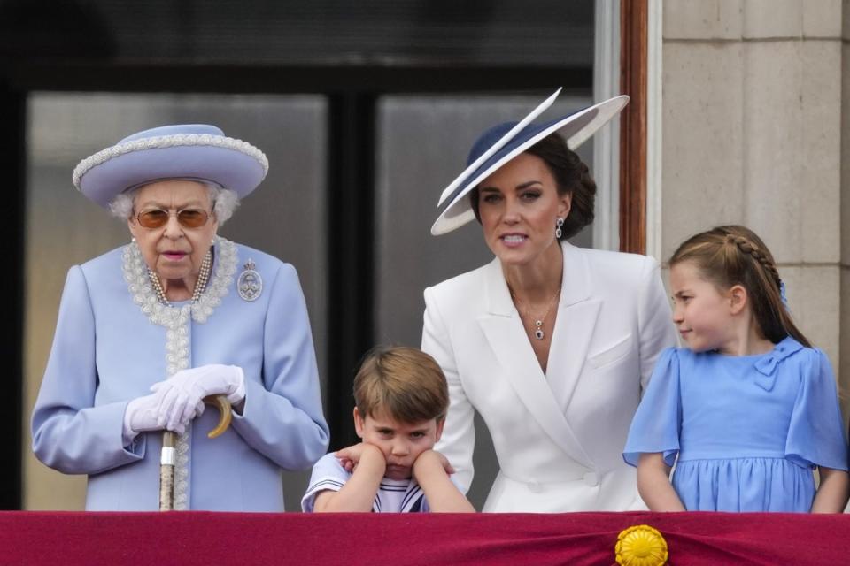 The Queen, Prince Louis, the Duchess of Cornwall and Princess Charlotte on the balcony of Buckingham Palace (PA) (PA Wire)