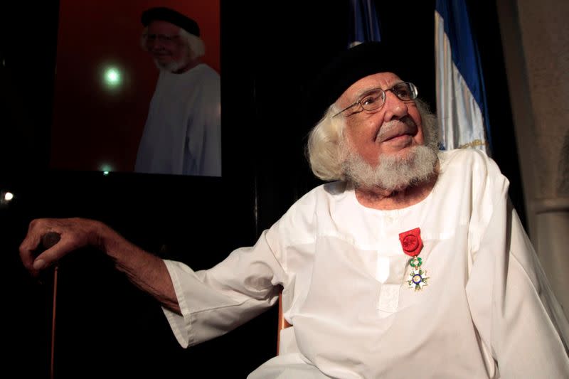 FILE PHOTO: Nicaraguan poet and Catholic priest Ernesto Cardenal sits after he was awarded the Legion of Honor order during a reception in Managua