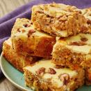 <p>All your favourite <a href="https://www.delish.com/uk/cooking/recipes/a28826709/carrot-cake-banana-bread-recipe/" rel="nofollow noopener" target="_blank" data-ylk="slk:carrot cake;elm:context_link;itc:0;sec:content-canvas" class="link ">carrot cake</a> flavours transformed into one delectable <a href="https://www.delish.com/uk/cooking/recipes/a30713621/reeses-peanut-butter-blondies-recipe/" rel="nofollow noopener" target="_blank" data-ylk="slk:blondie;elm:context_link;itc:0;sec:content-canvas" class="link ">blondie</a> complete with cream cheese swirl! If you’re a carrot cake purist, you can leave out the walnuts and sultanas.</p><p>Get the <a href="https://www.delish.com/uk/cooking/recipes/a31190492/carrot-cake-blondies/" rel="nofollow noopener" target="_blank" data-ylk="slk:Carrot Cake Blondies;elm:context_link;itc:0;sec:content-canvas" class="link ">Carrot Cake Blondies</a> recipe.</p>