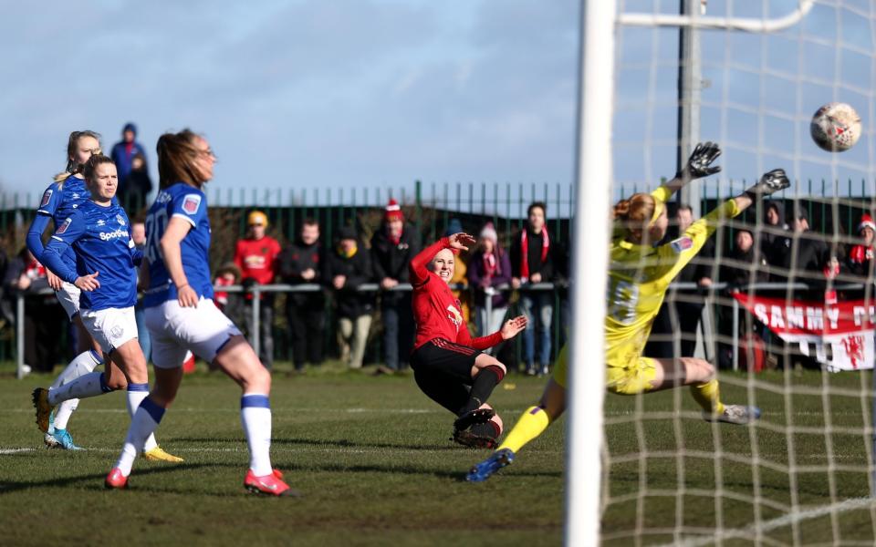 Leah Galton of Manchester United scores her sides first goal during the Barclays FA Women's Super League - GETTY IMAGES