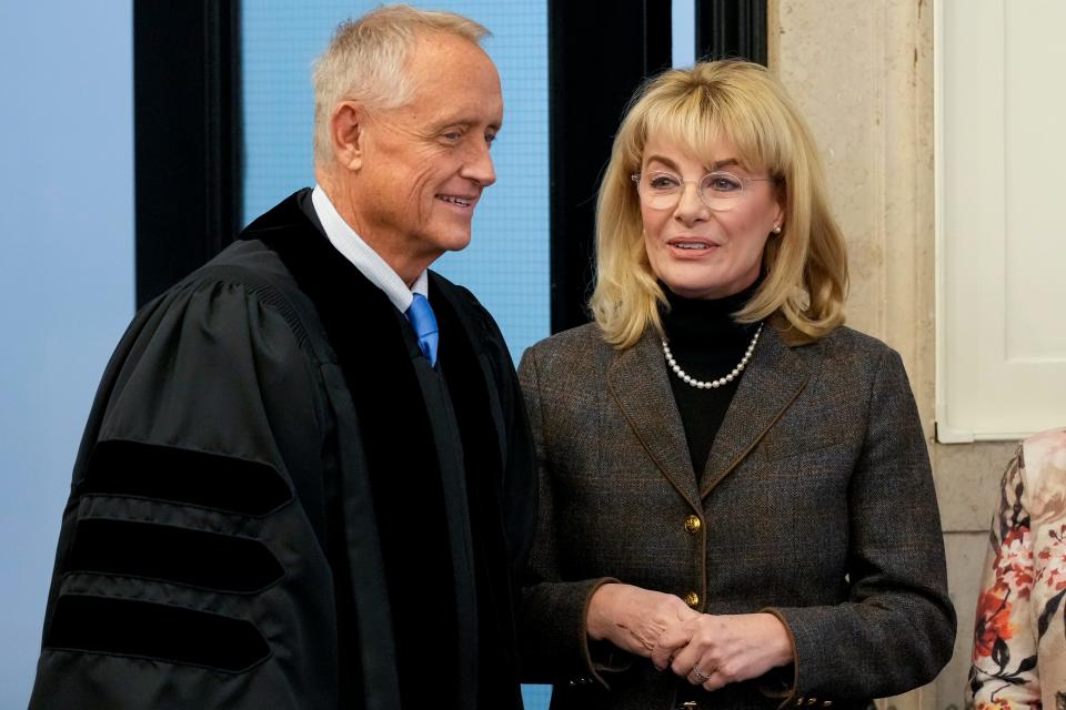 New Hamilton County Prosecutor Melissa Powers talks with her predecessor, and new Ohio Supreme Court Justice, Joe Deters at the Hamilton County Courthouse in downtown Cincinnati on Tuesday, Jan. 24, 2023.