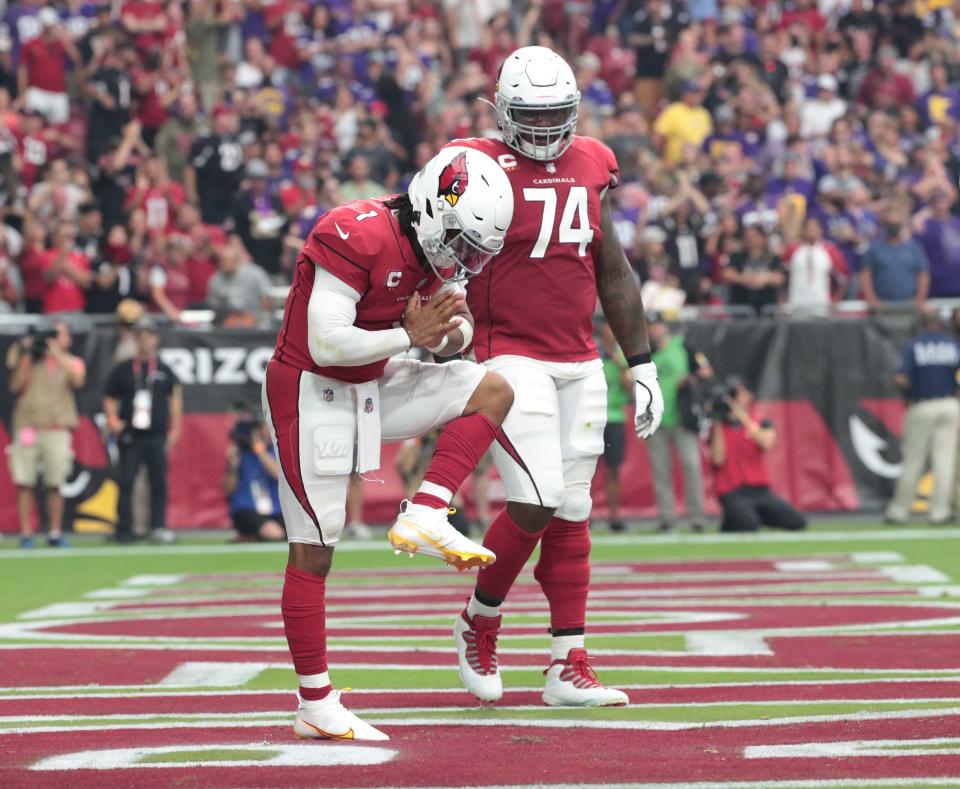 Arizona Cardinals quarterback Kyler Murray (1) bows after a touchdown run against the Minnesota Vikings during the second quarter in Glendale, Ariz. Sept. 19, 2021.