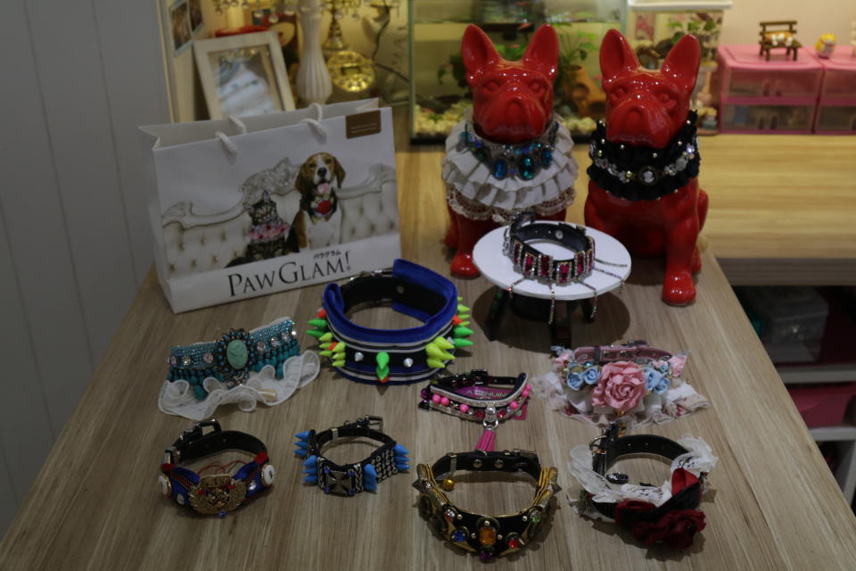 Some of pet fashion designer Sia Aiwei’s creations. (Photo: Abdul Rahman Azhari/Yahoo Lifestyle Singapore)