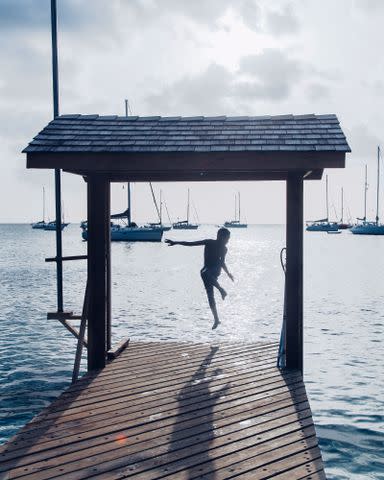 <p>JÃ©rÃ´me Galland</p> A leap off the docks in Port Elizabeth, Bequia, is a cherished ritual for many