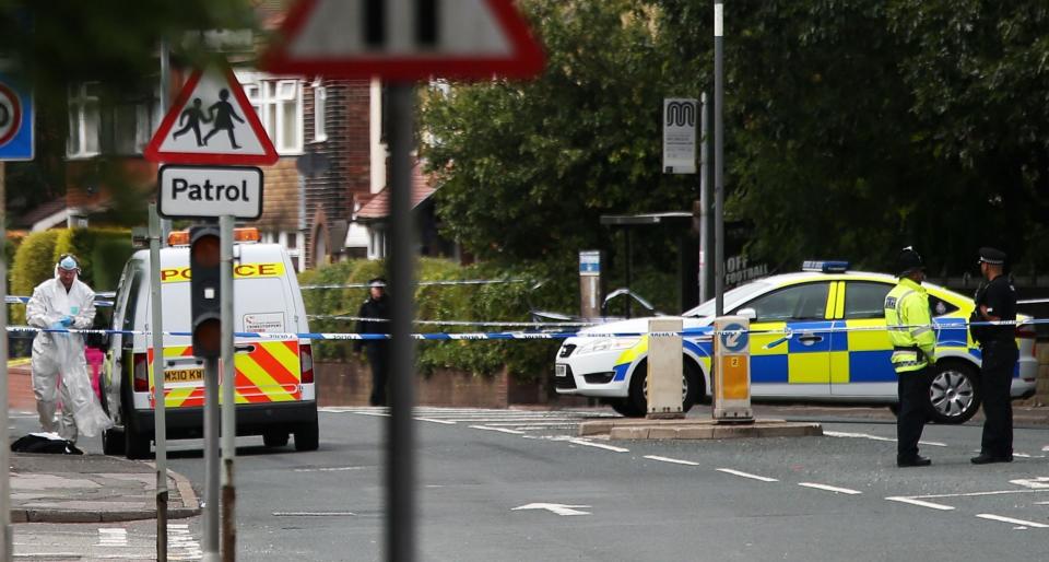 Police in Salford after businessman Paul Massey was shot dead at his house (PA)