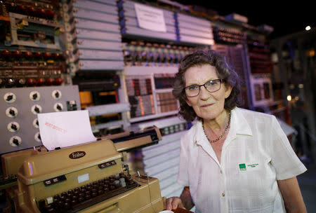 National Museum of Computing trustee Margaret Sale poses by the Colossus machine at Bletchley Park in Milton Keynes, Britain, September 15, 2016. Picture taken September 15, 2016. REUTERS/Darren Staples