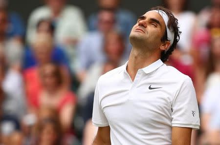 Britain Tennis - Wimbledon - All England Lawn Tennis & Croquet Club, Wimbledon, England - 8/7/16 Switzerland's Roger Federer reacts during his match against Canada's Milos Raonic REUTERS/Clive Brunskill/Pool