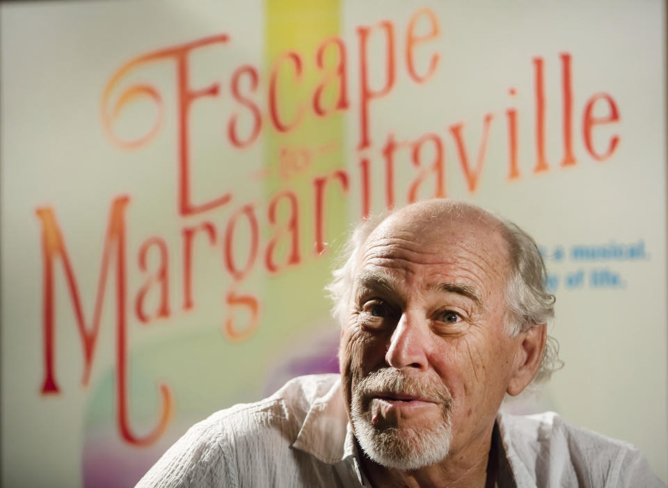 FILE - Jimmy Buffett talks about the premiere of "Escape to Margaritaville" at the Saenger Theater in New Orleans on Monday, June 12, 2017. Buffett, who popularized beach bum soft rock with the escapist Caribbean-flavored song “Margaritaville” and turned that celebration of loafing into an empire of restaurants, resorts and frozen concoctions, has died, Friday, Sept. 1, 2023. (Chris Granger /The Times-Picayune/The New Orleans Advocate via AP)