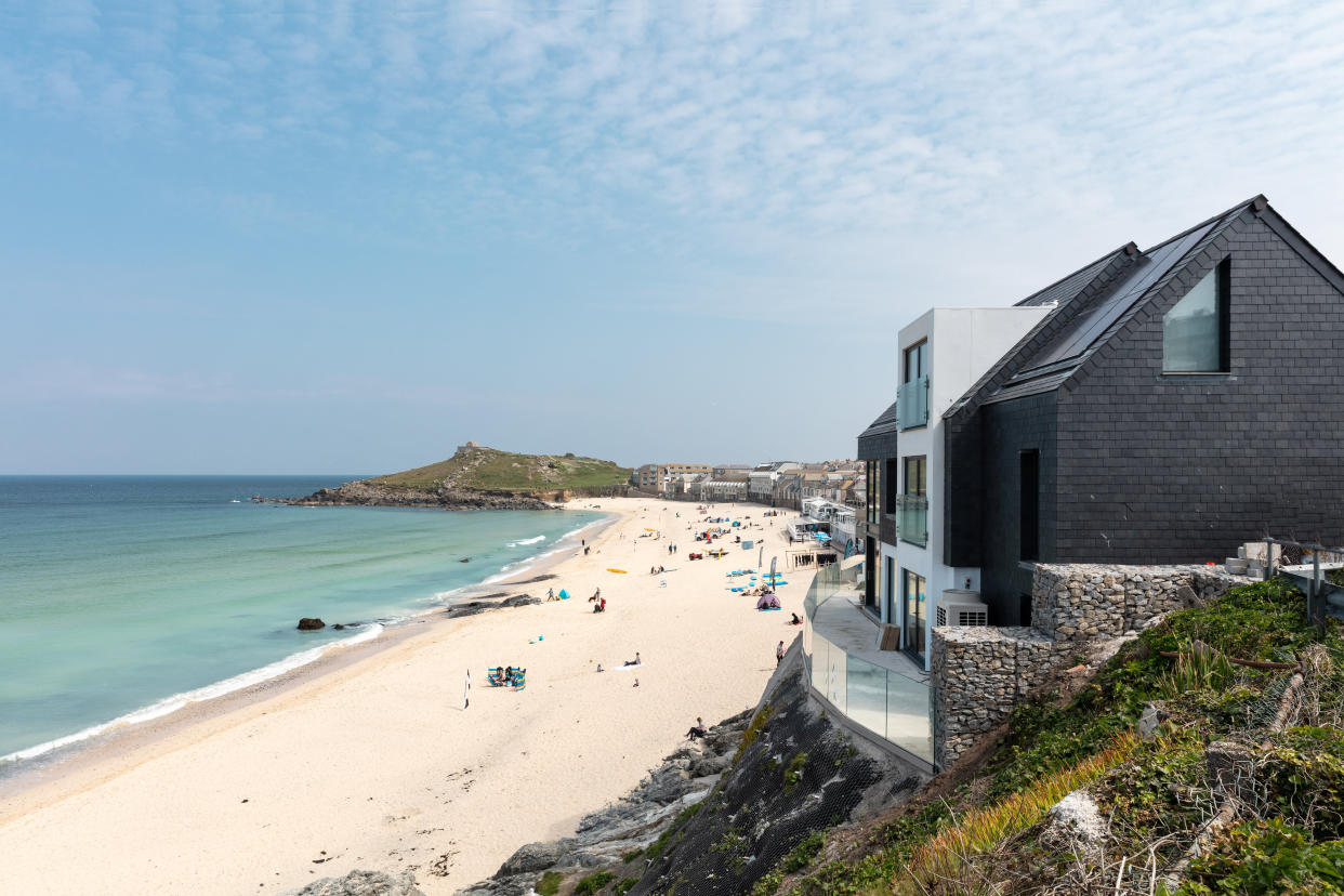 A former council house has been transformed into one of Britain's most luxurious holiday homes. (SWNS)