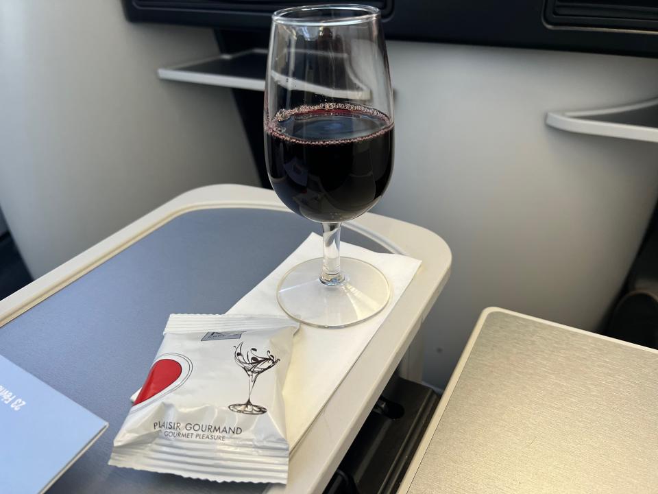 Flying on La Compagnie all-business class airline from Paris to New York — the wine and nuts.