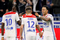 Soccer Football - Ligue 1 - Olympique Lyonnais vs OGC Nice - Groupama Stadium, Lyon, France - May 19, 2018 Lyon's Memphis Depay celebrates scoring their third goal and completing his hat-trick with team mates REUTERS/Emmanuel Foudrot