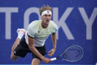 Alexander Zverev, of Germany, serves to Karen Khachanov, of the Russian Olympic Committee, during the men's single gold medal match of the tennis competition at the 2020 Summer Olympics, Sunday, Aug. 1, 2021, in Tokyo, Japan. (AP Photo/Patrick Semansky)