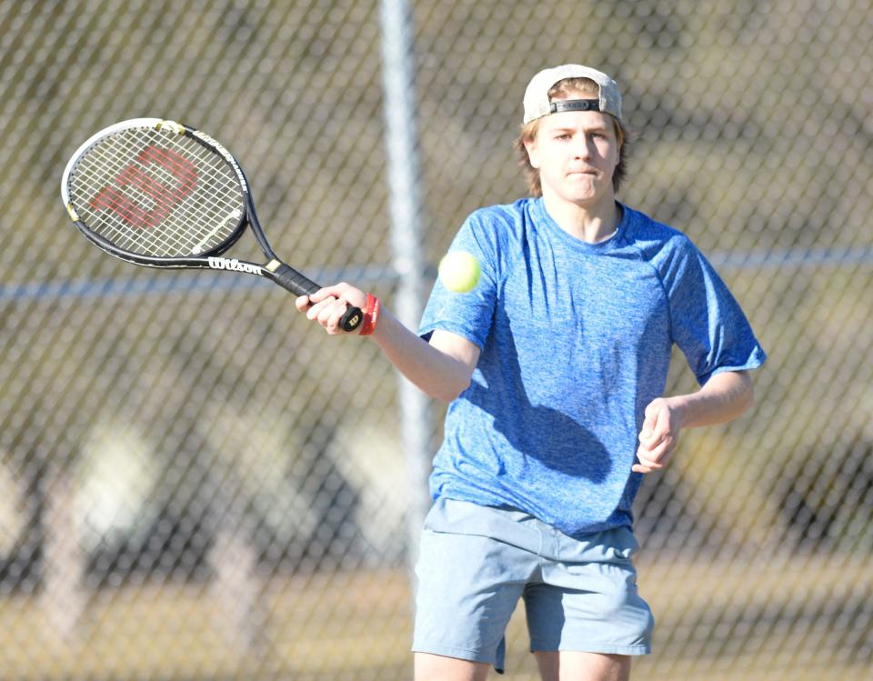 Cathedral/St. John's Prep senior Chandler Hendricks hits a forehand Monday, April 11, 2022, at Discovery Community School in Waite Park.