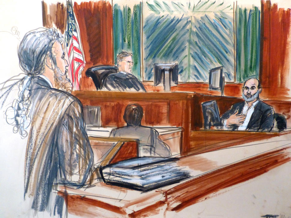 In this courtroom sketch, Osama bin Laden's son-in-law Sulaiman Abu Ghaith, right, testifies at his trial Wednesday, March 19, 2014, in New York, on charges he conspired to kill Americans and aid al-Qaida as a spokesman for the terrorist group. Listening to testimony are Judge Lewis Kaplan, center, and defense attorney Stanley Cohen, at podium. In his surprise testimony, Abu Ghaith recounted the night of the Sept. 11, 2001, attacks, when the al-Qaida leader sent a messenger to drive him into a mountainous area for a meeting inside a cave in Afghanistan. "Did you learn what happened? We are the ones who did it," Abu Ghaith, recalled bin Laden telling him. (AP Photo/Elizabeth Williams)