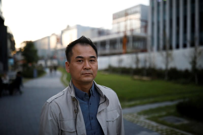 Park Chol-hee, whose brother was killed in a crane collapse in 2017 at a Samsung shipyard, poses for photographs in Seoul