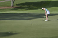 Michelle Wie West putts on the 10th green during Round 1 of 2021 KPMG Women's PGA Championship at Atlanta Athletic Club in Johns Creek, Ga., Thursday, June 24, 2021. (Hyosub Shin/Atlanta Journal-Constitution via AP)