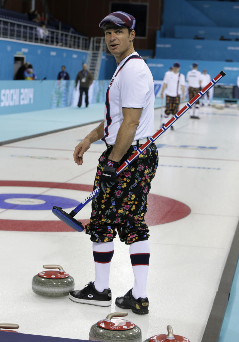 Norway skip Thomas Ulsrud wears rose-painting knickers and a patterned flat cap at curling training at the 2014 Winter Olympics, Saturday, Feb. 8, 2014, in Sochi, Russia. (AP Photo/Robert F. Bukaty)