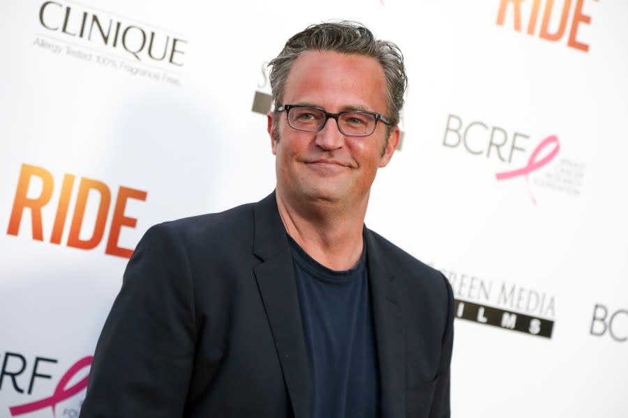 In this April 28, 2015, file photo, Matthew Perry arrives at the LA Premiere of "Ride" in Los Angeles. The former "Friends" star appears with Katie Holmes, who reprises her role as Jackie Kennedy in "The Kennedys After Camelot,” which premieres on the Reelz channel on April 2. (Photo by Rich Fury/Invision/AP, File)