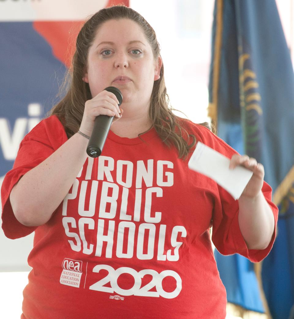 Cassie Lyles, a Fairdale High School social studies teacher and member of the Jefferson County Teachers Association board, speaks in favor of strong public schools at a  "Bullied by Bevin: Restore Civility in Public Service" picnic sponsored by Kentucky Senator Dan Seum.28 September 2019
