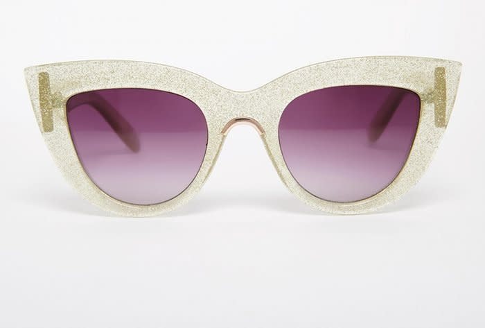 <p><a href="http://www.asos.com/ASOS/ASOS-Flat-Top-Cat-Eye-Sunglasses-With-Metal-Sandwich-And-Flat-Lens/Prod/pgeproduct.aspx?iid=6204594&cid=4545&Rf-400=53&sh=0&pge=1&pgesize=36&sort=-1&clr=Silverglitter&totalstyles=114&gridsize=3" rel="nofollow noopener" target="_blank" data-ylk="slk:Buy them here.;elm:context_link;itc:0;sec:content-canvas" class="link ">Buy them here. </a></p>