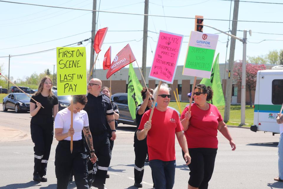 Sault Ste. Marie paramedics, alongside some students in training, occupy the intersection of Great Northern Road and Lukenda Drive Tuesday afternoon to air their grievances over wages and other pitfalls associated with the job. The local paramedics' union and employer are currently negotiating a new contract, with the last agreement having expired on April 1, 2023.