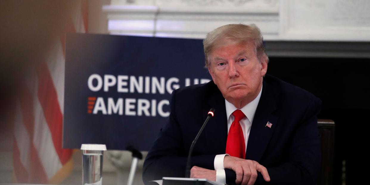 President Donald Trump listens as Dr. Deborah Birx, White House coronavirus response coordinator, speaks during a roundtable with industry executives about reopening country after the coronavirus closures, in the State Dining Room of the White House, Friday, May 29, 2020, in Washington. (AP Photo/Alex Brandon)