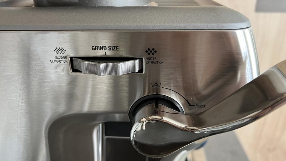 side view of steel coffee machine close up