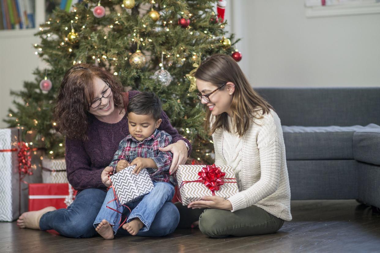 family exchanging gifts