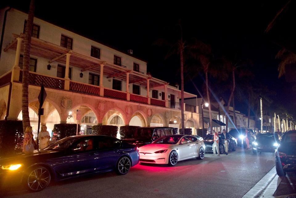 Cars are lined up at a valet station on Worth Avenue on Jan. 19.