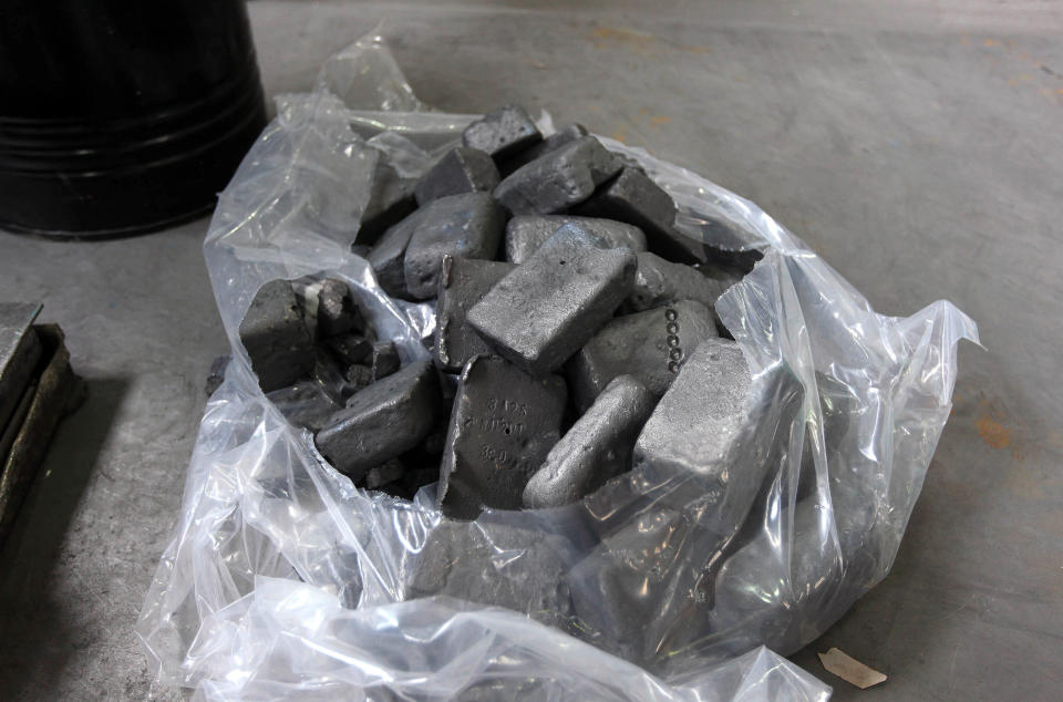 Neodymium ingots sit in a bag prior to being crushed at Neo Material Technologies Inc.'s Magnequench Tianjin Co. factory in Tianjin, China, on Friday, June 11, 2010. A generation after Chinese leader Deng Xiaoping made mastering neodymium and 16 other elements known as rare-earths a priority, China  has cornered the market, with far-reaching effects ranging from job losses and global trade to U.S. national security. Photographer: Doug Kanter/Bloomberg via Getty Images