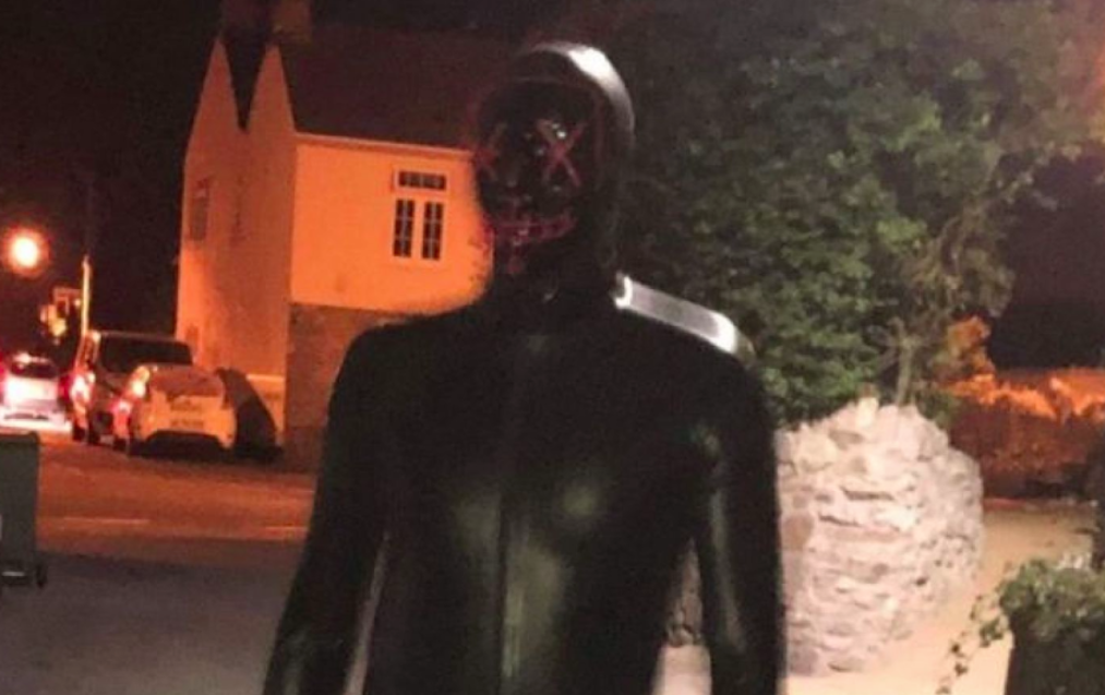 A man was seen in a gimp suit in a village (Picture: Avon & Somerset Police)