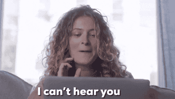 person on their computer saying, i can't hear you