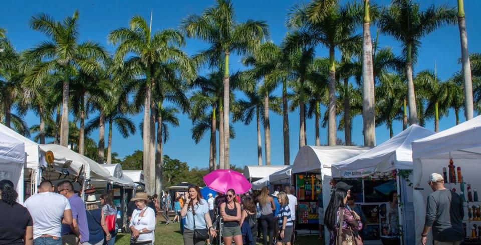 Blue skies and palm trees are the backdrop for the Beaux Arts Festival of Art held each year on the University of Miami campus. Photo by MagicalPhotos.com / Mitchell Zachs