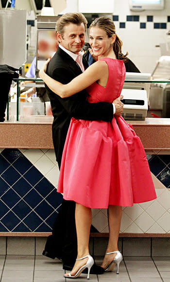 Season 6: Only Carrie could away with wearing a pink Oscar de la Renta to the Met and then McDonalds.