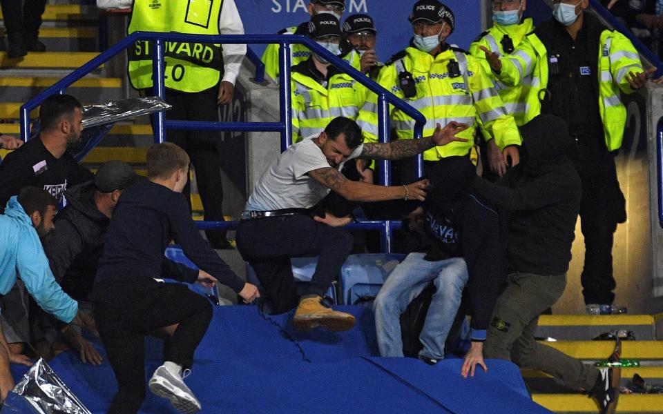 Napoli ultras fight with Leicester City fans and police as violence mars Europa League clash - GETTY IMAGES