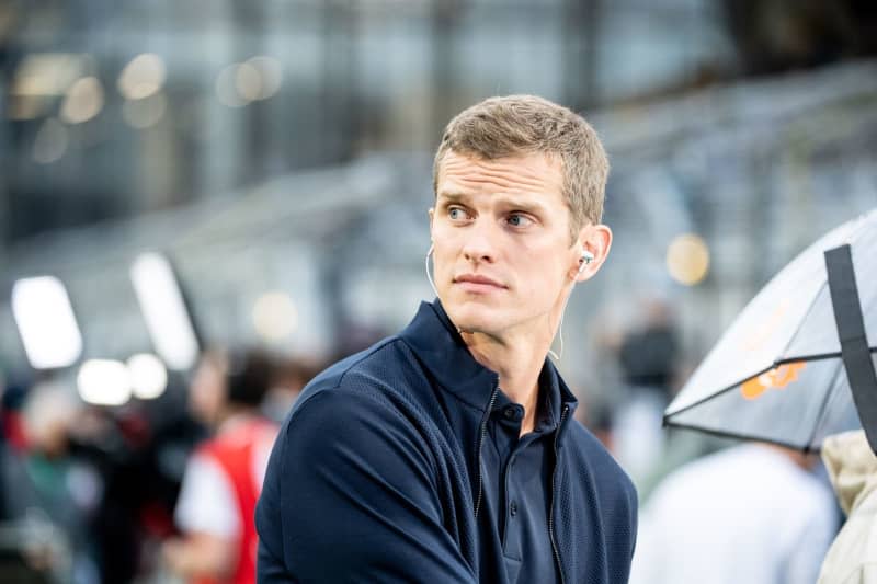 Former Borussia Dortmund player Sven Bender gives an interview before the start of the German DFB Cup soccer match between TSV 1860 Munich and Borussia Dortmund at Gruenwalder Stadion. Former Borussia Dortmund players Nuri Sahin and Sven Bender are set to return to the Bundesliga club as assistant coaches, media reports said on Friday. Matthias Balk/dpa
