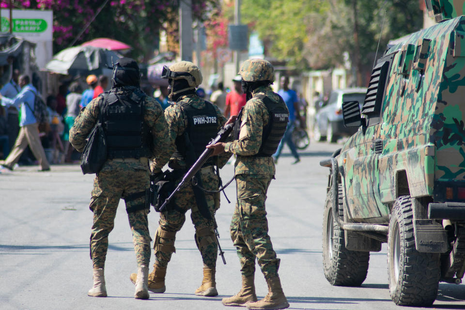 Haitian police officers deployed in Port-au-Prince, Haiti, on March 9, 2024, as residents desperately sought shelter amid a recent explosion of gang violence in the Haitian capital. / Credit: CLARENS SIFFROY/AFP via Getty Images