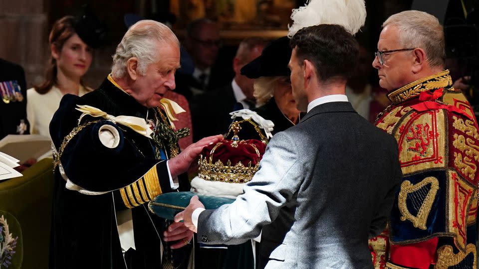 King Charles III is presented with the Crown of Scotland at St. Giles' Cathedral, Edinburgh on July 5, 2023.  - Jane Barlow/Reuters