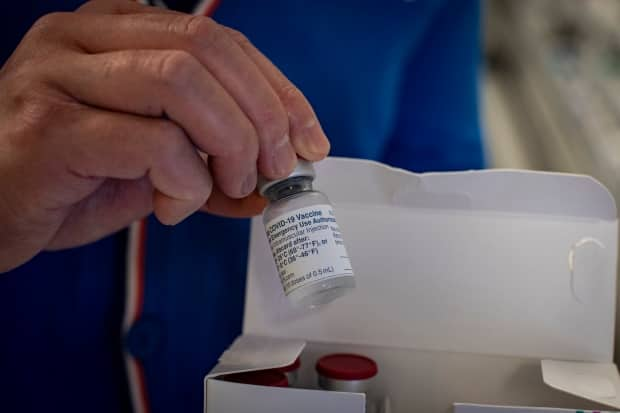 Ontario pharmacists who expected to spend the weekend racing to administer 45,000 doses of the AstraZeneca-Oxford vaccine set to expire have been given a reprieve from Health Canada. (Evan Mitsui/CBC - image credit)