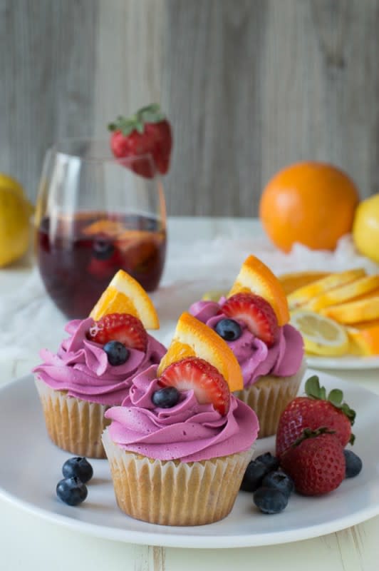 <p>The First Year Blog</p><p>These Sangria Cupcakes are made with fruit in the batter and a red wine buttercream, for the perfect party cupcakes!</p><p><strong>Get the recipe: <a href="https://thefirstyearblog.com/sangria-cupcakes/" rel="nofollow noopener" target="_blank" data-ylk="slk:Sangria Cupcakes;elm:context_link;itc:0;sec:content-canvas" class="link ">Sangria Cupcakes</a></strong></p>