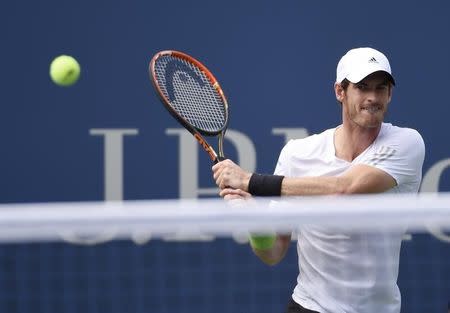 Sep 1, 2014; New York, NY, USA; Andy Murray (GBR) returns to Jo-Wilfried Tsonga (FRA) on day eight of the 2014 U.S. Open tennis tournament at USTA Billie Jean King National Tennis Center. Mandatory Credit: Robert Deutsch-USA TODAY Sports