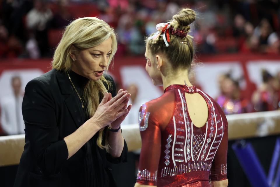 The OU women's gymnastics team has participated in the Metroplex Challenge in all but one season since K.J. Kindler, left, arrived as coach.