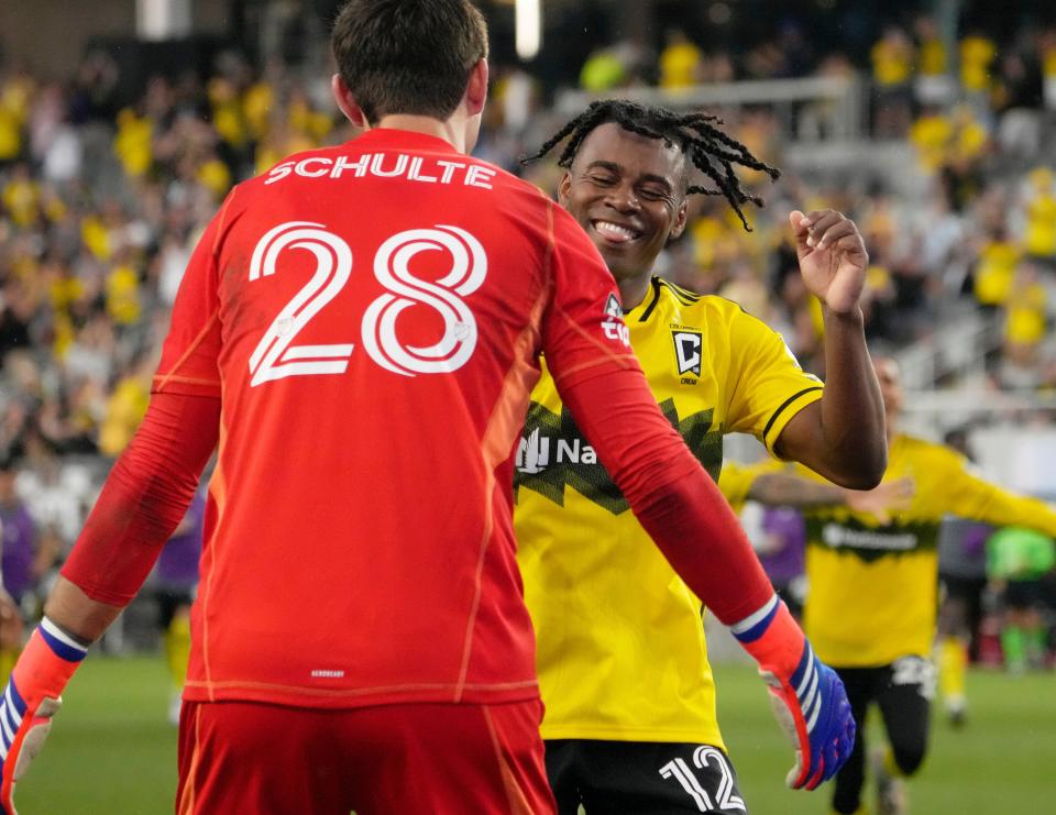 August 17, 2024; Columbus, Ohio, USA; 
Columbus Crew goalkeeper Patrick Schulte (28) and defender DeJuan Jones (12) celebrate Jones’ winning penalty kick against New York City FC during a Leagues Cup quarterfinal match at Lower.com Field.